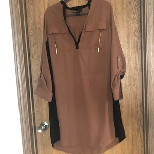 Brown dress with front pockets and gold zippers